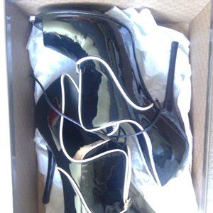 Used, like-new patent leather Gucci heels size 8C